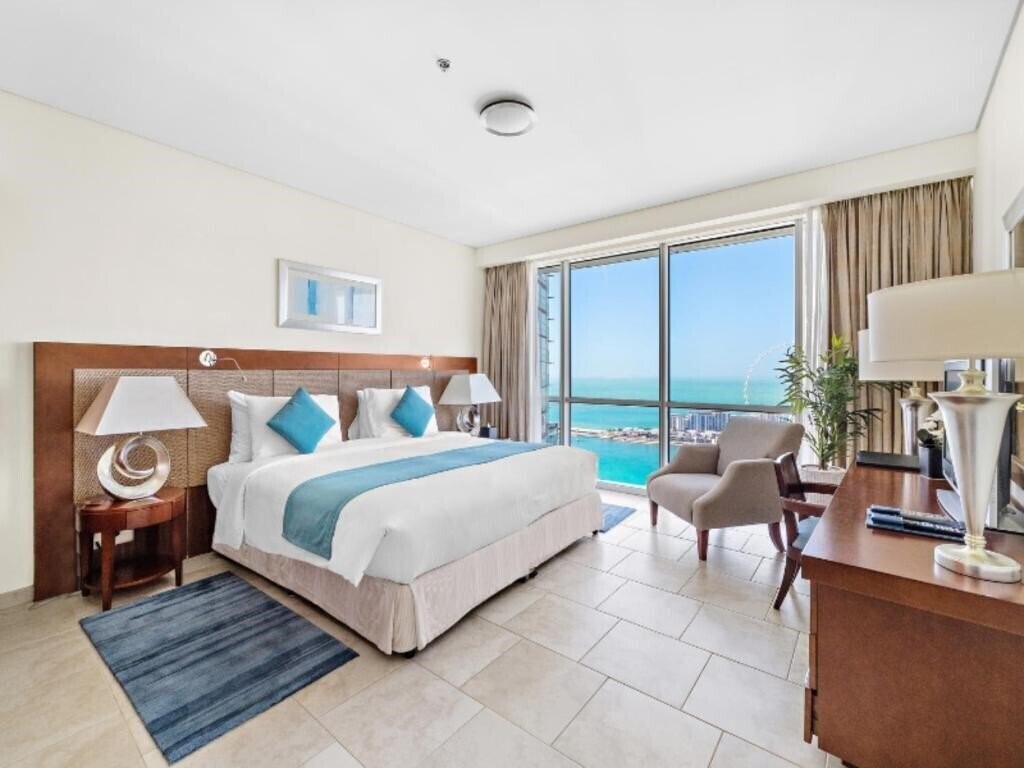 Фото Blue Beach Tower (ex. JA Oasis Beach Tower, Oasis Beach Deluxe Apartments) апартаменты