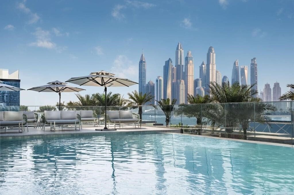 Отель Radisson Beach Resort Palm Jumeirah 4*