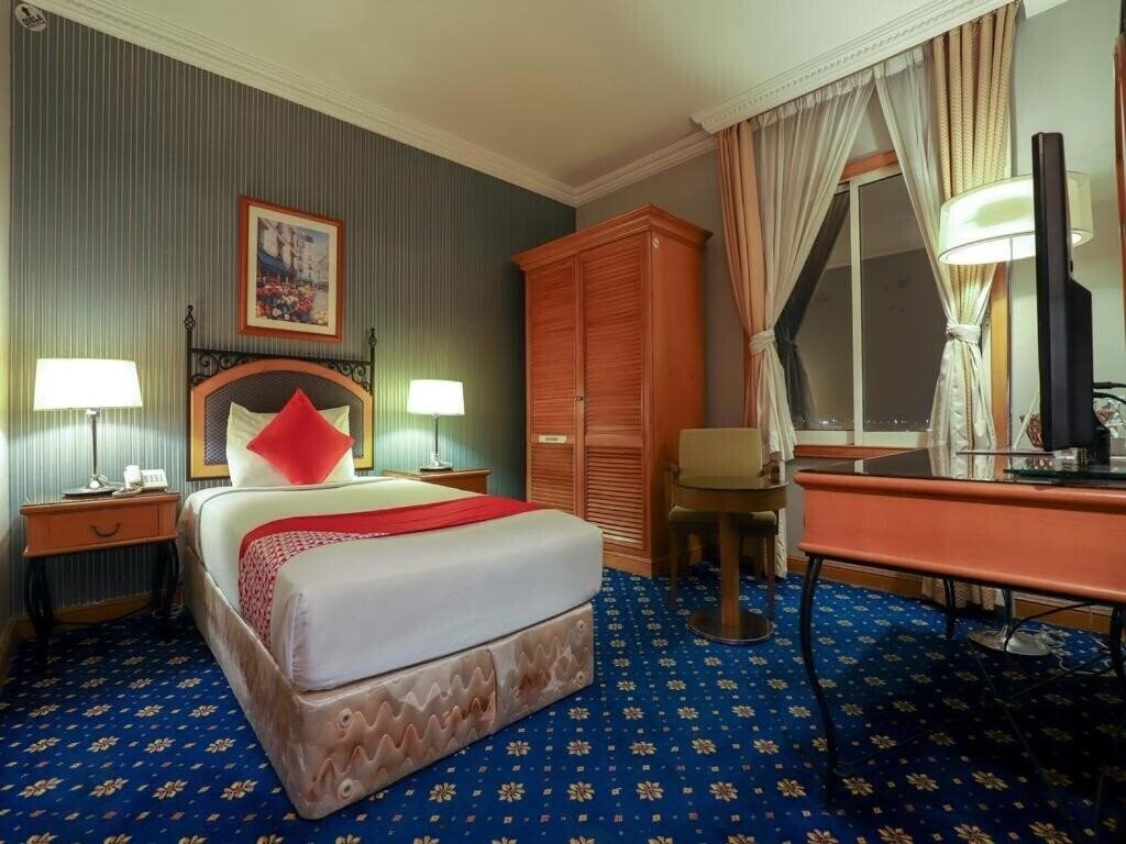 Фото Oyo 328 City Plaza Hotel 2*