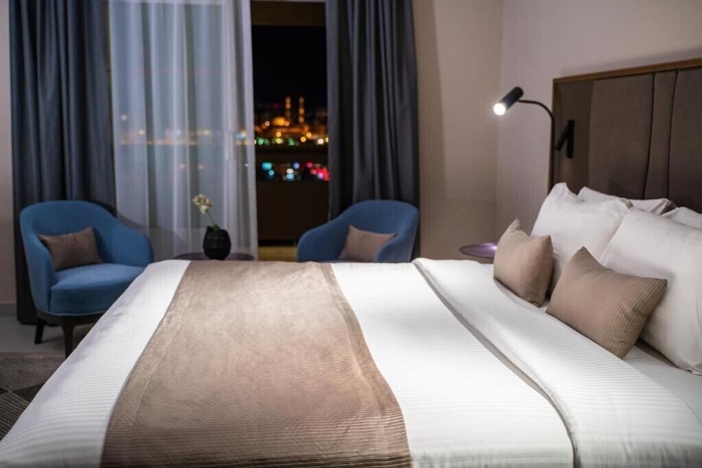 Holiday International (ex. Holiday International Hotel) 4* суреті