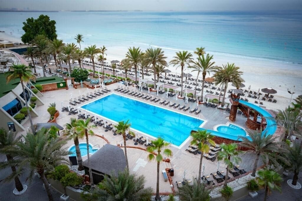 Отель Occidental Sharjah Grand Hotel 4*