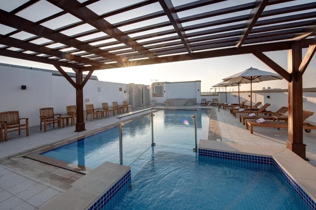 Center Hotel Sharjah 4* суреті