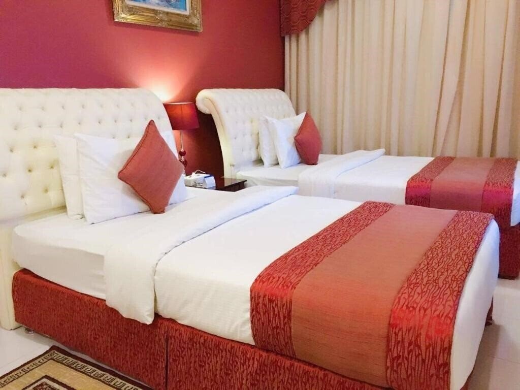 Отель Al Maha Regency Suites 4*
