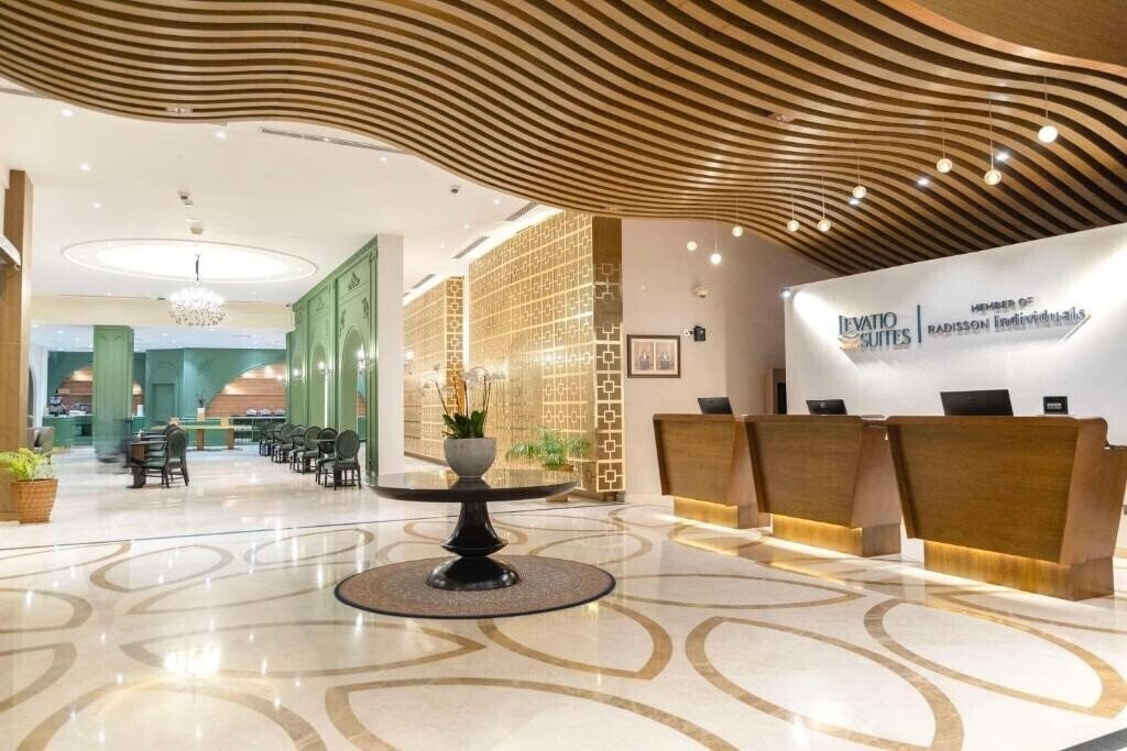 Отель Levatio Suites Muscat, A Member of Radisson Individuals 4*