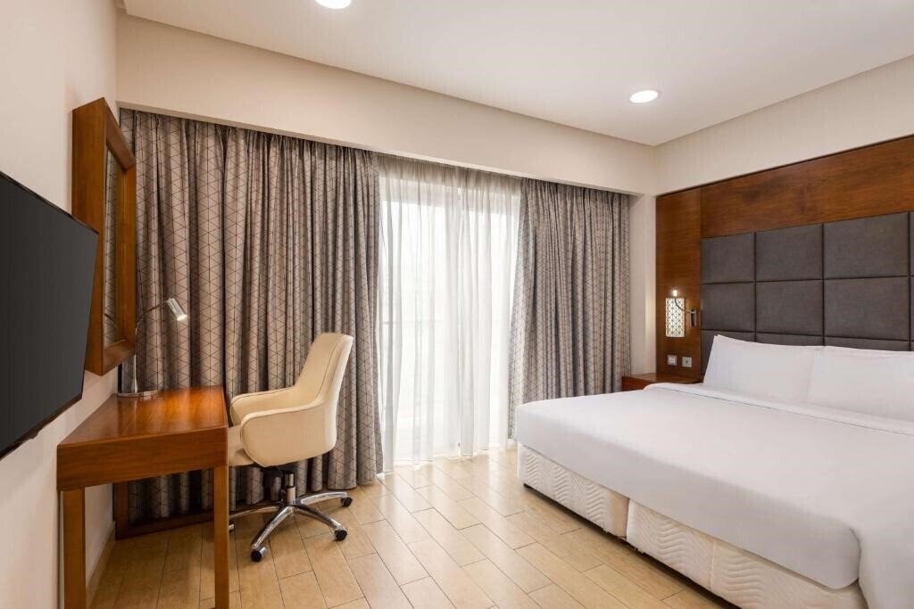 Фото Levatio Suites Muscat, A Member of Radisson Individuals 4*