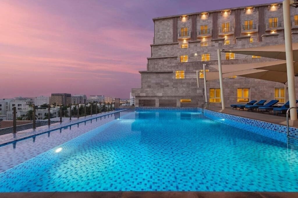Изображение Levatio Suites Muscat, A Member of Radisson Individuals 4*
