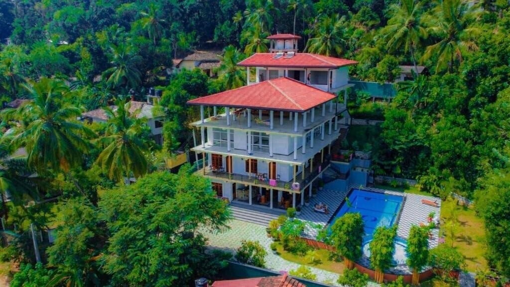 Изображение Coral Palm Villa & Apartment 2*