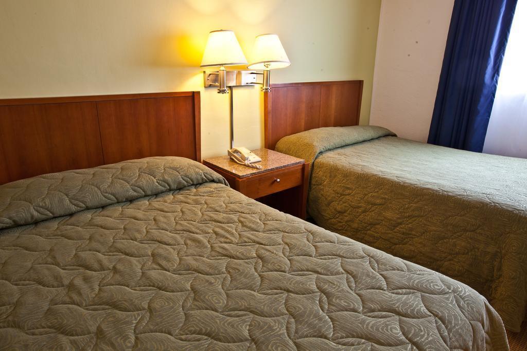 Oasis Inn 2* суреті