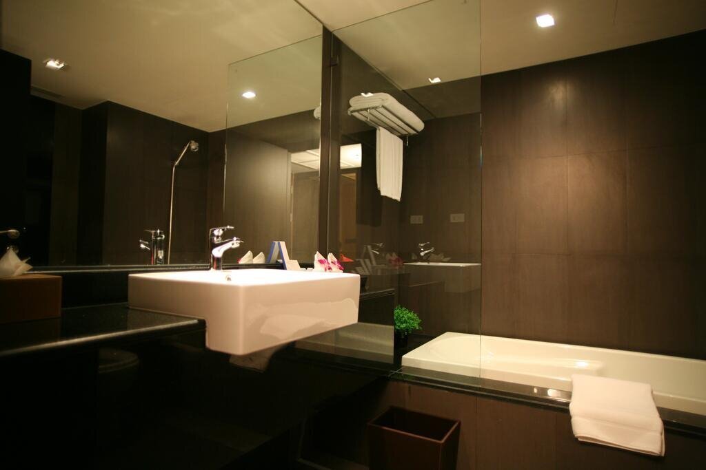 Golden Tulip Mandison Suites 4* фотосуреті