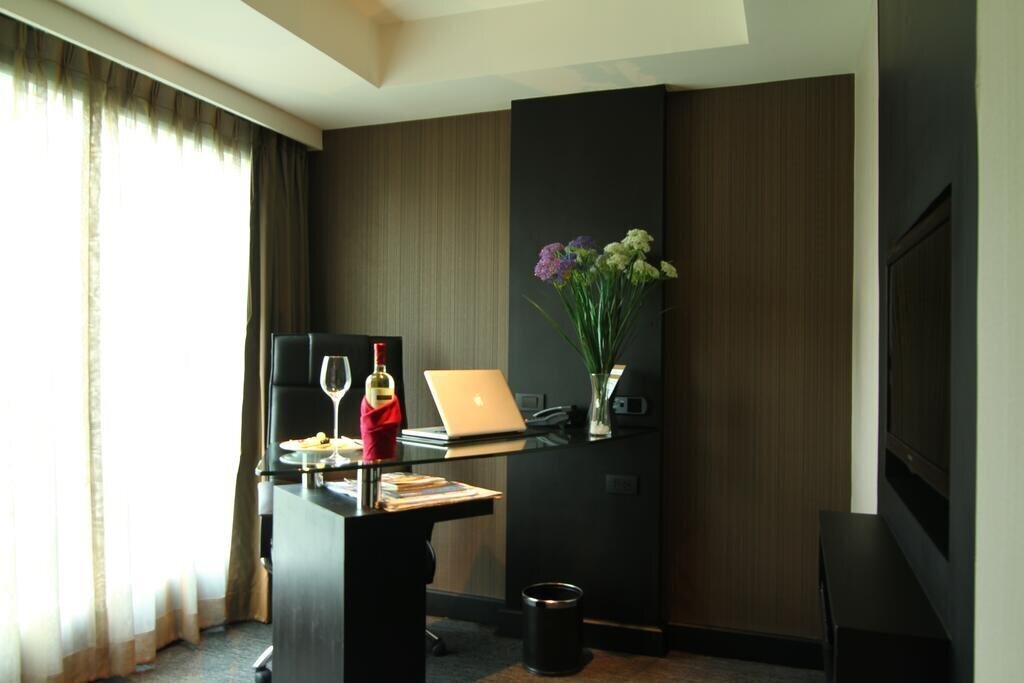 Golden Tulip Mandison Suites 4* суреті