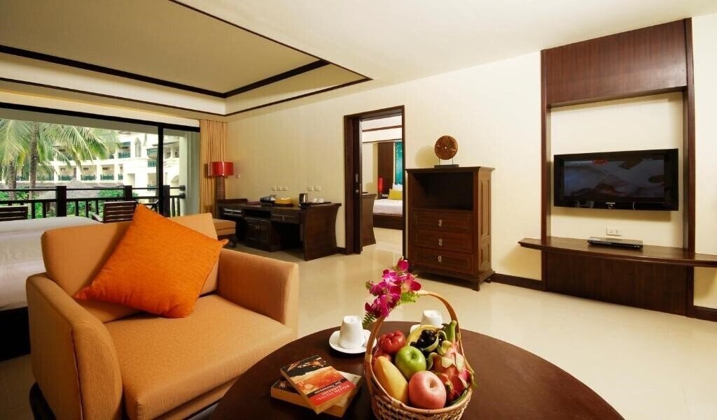 Фотография Khao Lak Orchid Beach Resort 3*