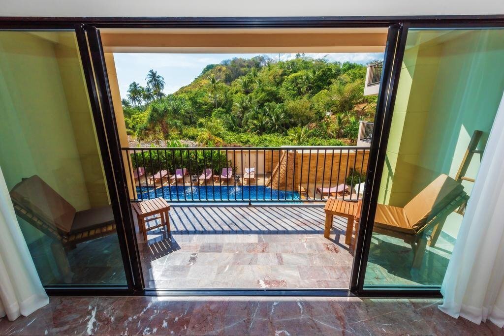 The Windmill Phuket Hotel 4* суреті