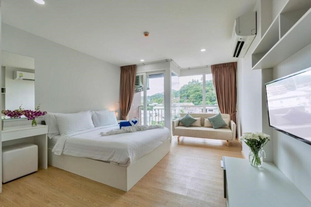 Фото Ozone Condotel Kata Beach 4*