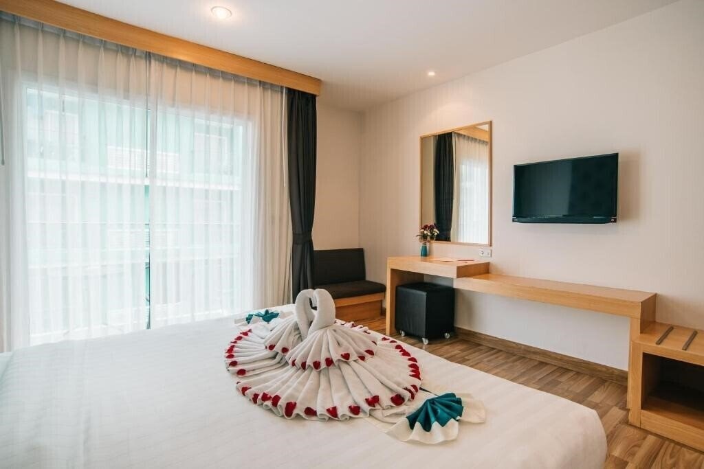 Icheck Inn Central Patong 3* суреті
