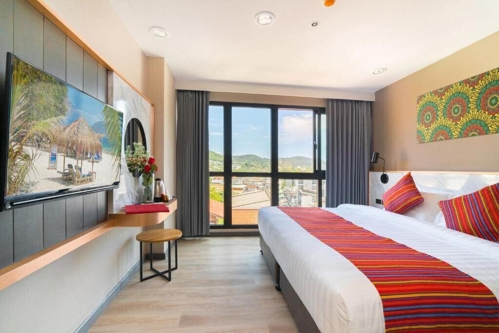 Фото Kk Karon Kata Boutique Hotel 4*