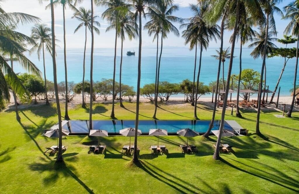 Отель The Haad Tien Beach Resort 4*