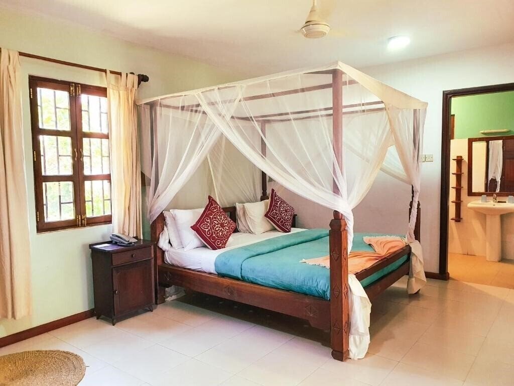 Flame Tree Cottages 3* суреті