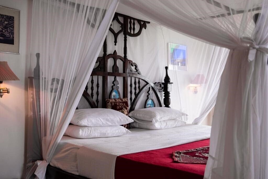 Tembo House 4* фотосуреті