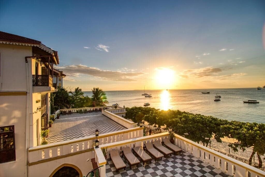 Tembo House 4* суреті