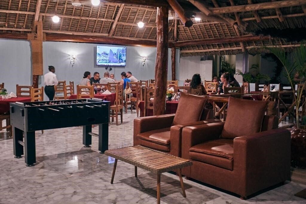 Malika Nungwi Hotel 4* фотосуреті