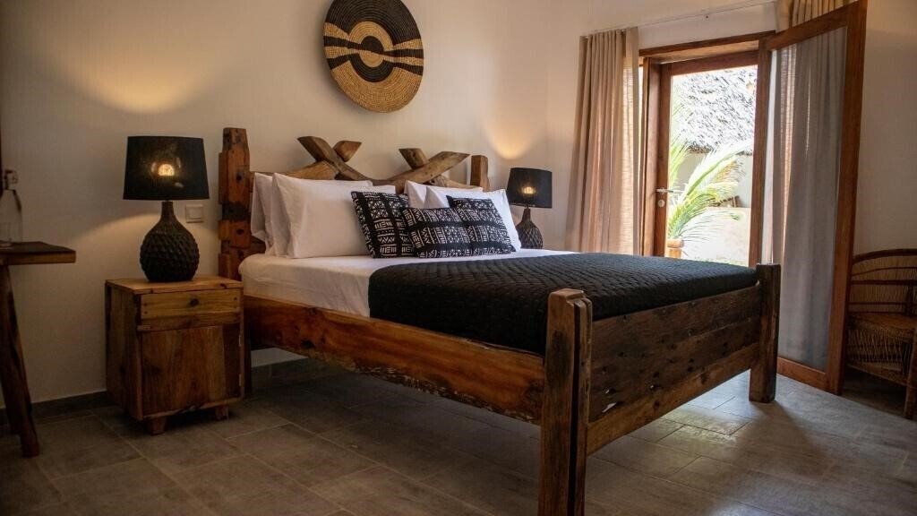 Фото Tamu Tamu Boutique Hotel 4*