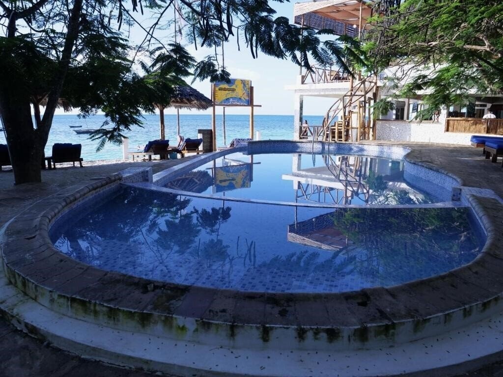 Double A Nungwi Beach Hotel 4* қонақ үйі