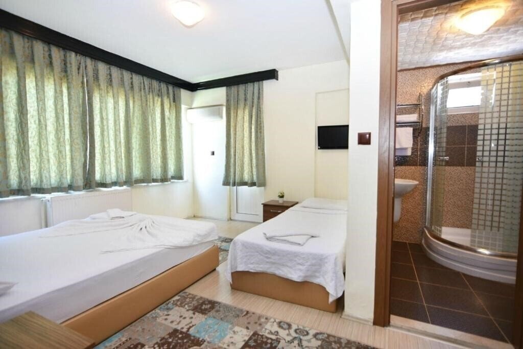 Kutlugun Sahil Otel 3* фотосуреті