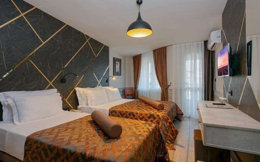 Monart City Hotel 4* фотосуреті