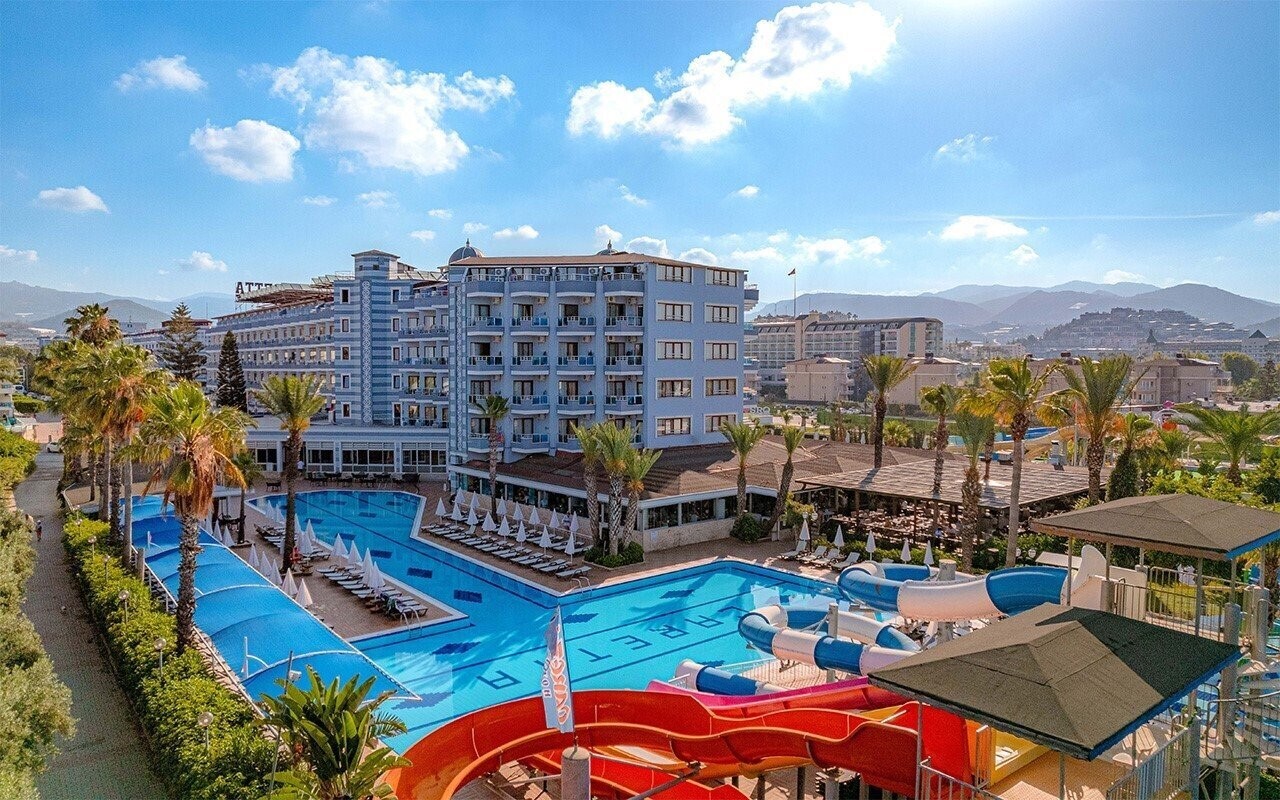 Отель Caretta Beach 4*