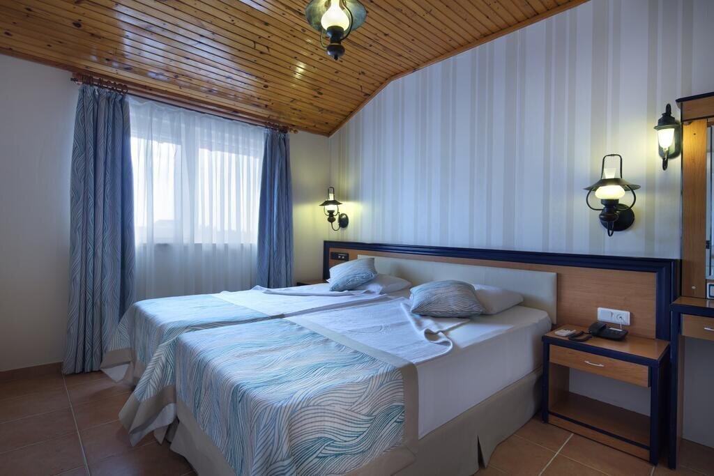 Villa Moonflower Aparts & Suites 4* суреті