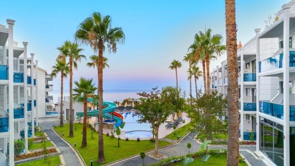 Фотография Eflina Resort Hotel & SPA (ex. Alanya Ladies Garden Hotel, Lion Hotel, Club Rasputin, Club Eva Hotel, Club Fiesta, Iso Asi Turkler) 3*