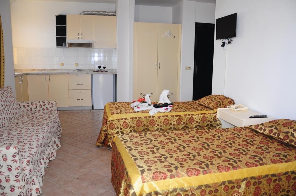 Gold Twins Suit Hotel 3* суреті