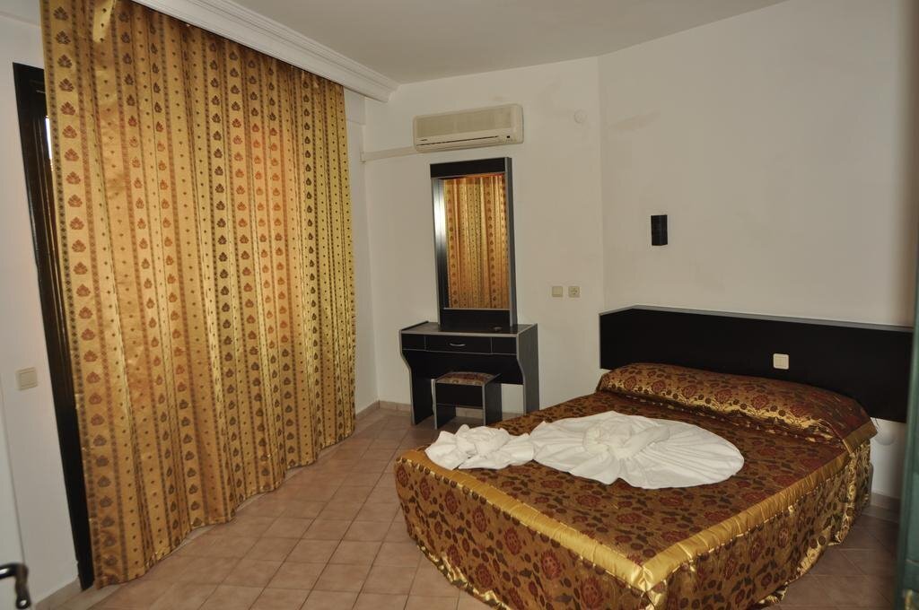 Gold Twins Suit Hotel 3* суреті