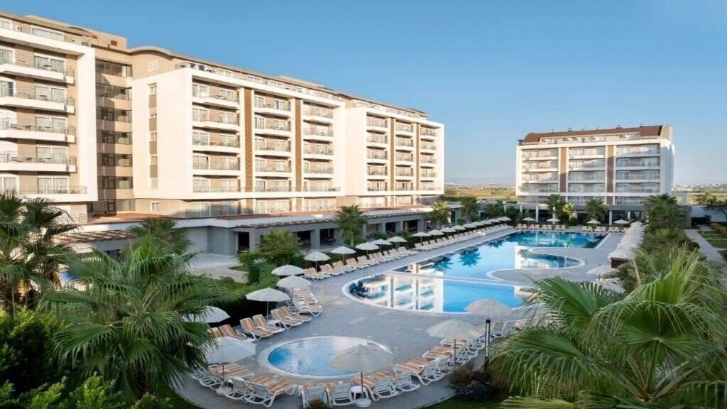 Отель Greenwood Suites Resort 5*