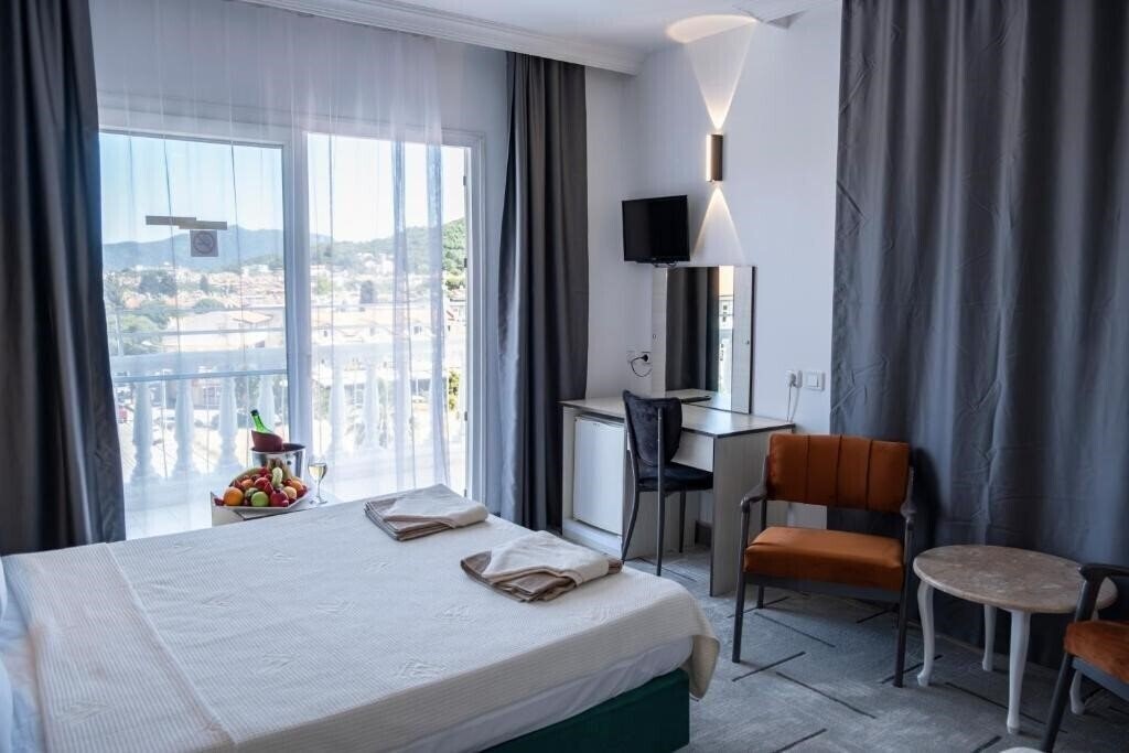 Mustis Royal Plaza 3* суреті