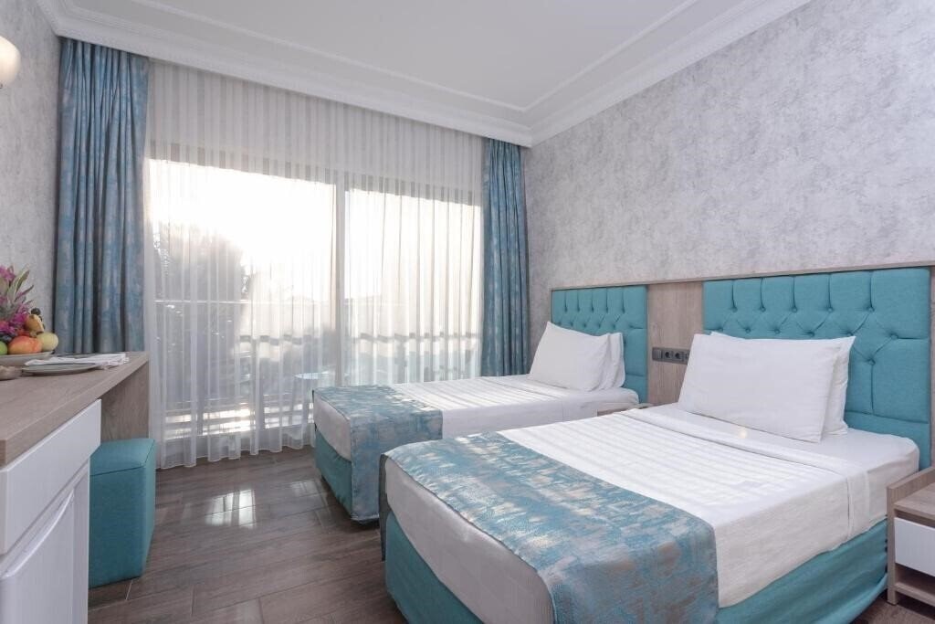 Anadolu Hotels Didim Club (ex. Palm Wings Beach Resort) 5* фотосуреті