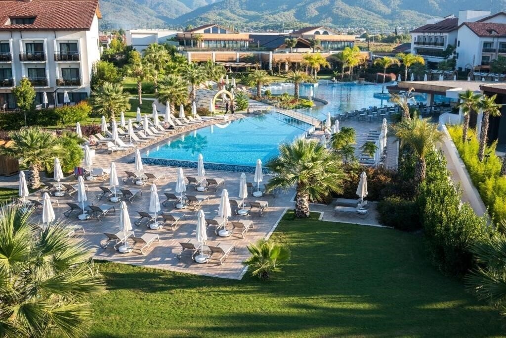 Фото Akra Fethiye Tui Blue Sensatori (ex. Tui Sensatori Resort Barut Fethiye, Barut Fethiye Sensatori) 5*