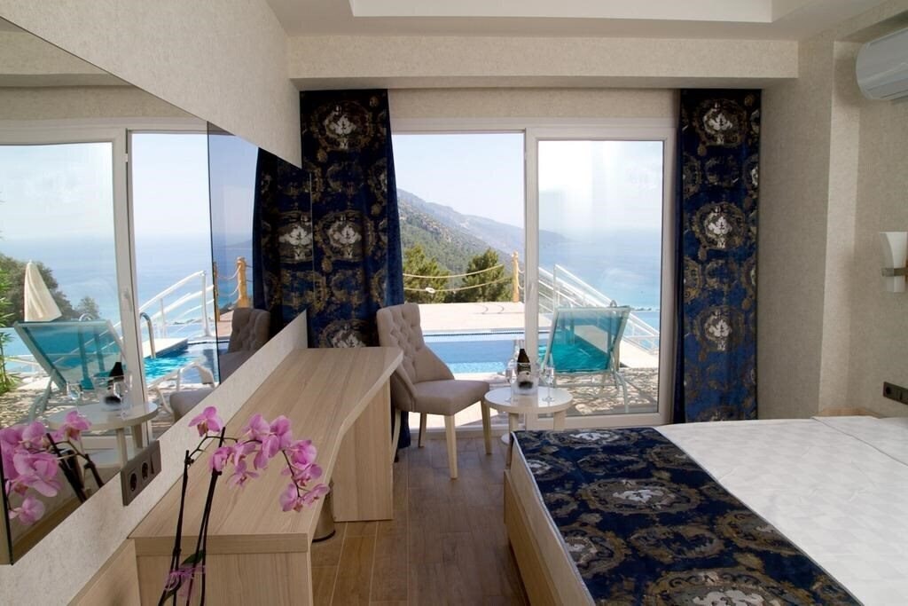 Sertil Deluxe Hotel & SPA (ex. Tropical Suites by Sertil, Ramada by Wyndham Fethiye Oludeniz) 4* суреті