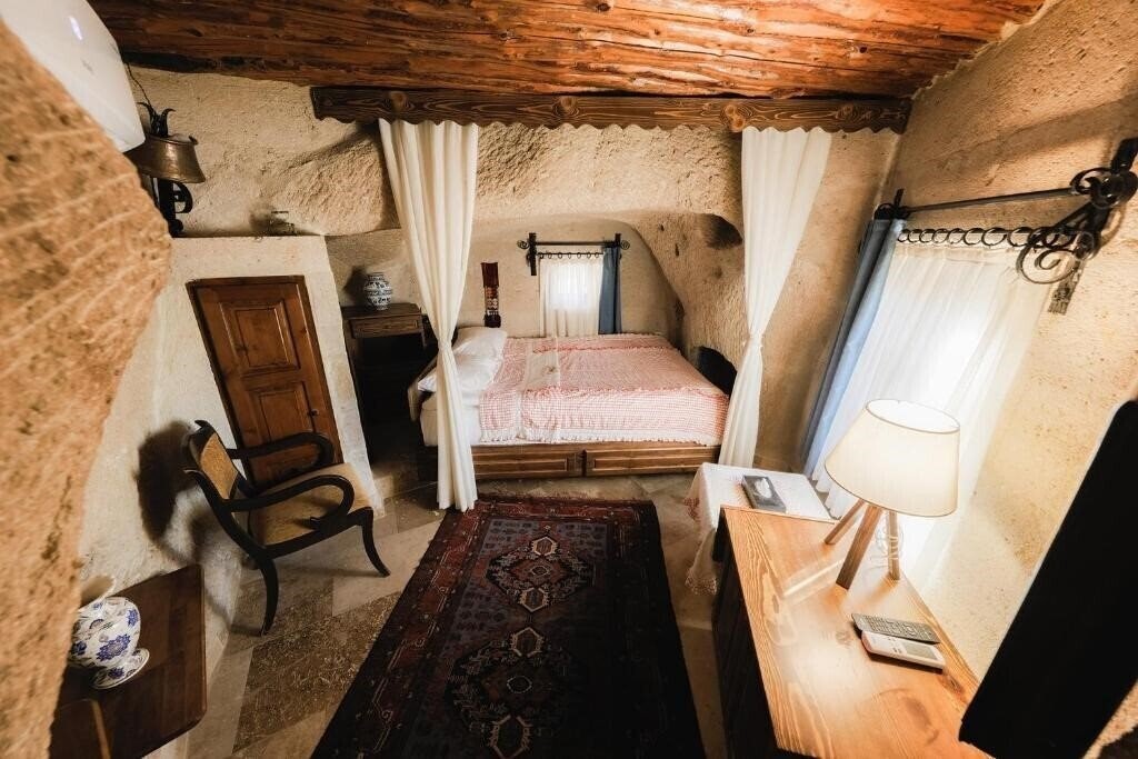 Фото Cappadocia Cave Suites 4*