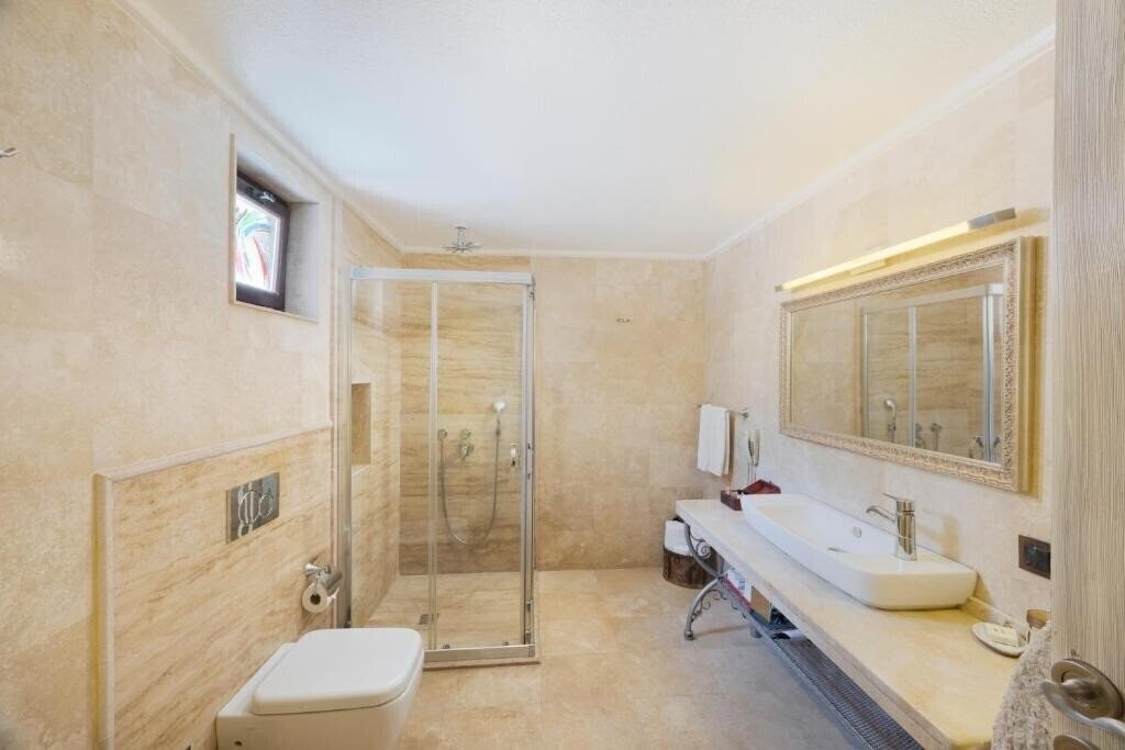 Фотография Tafoni Houses Cave Hotel (ex. Tafoni Evleri) 5*