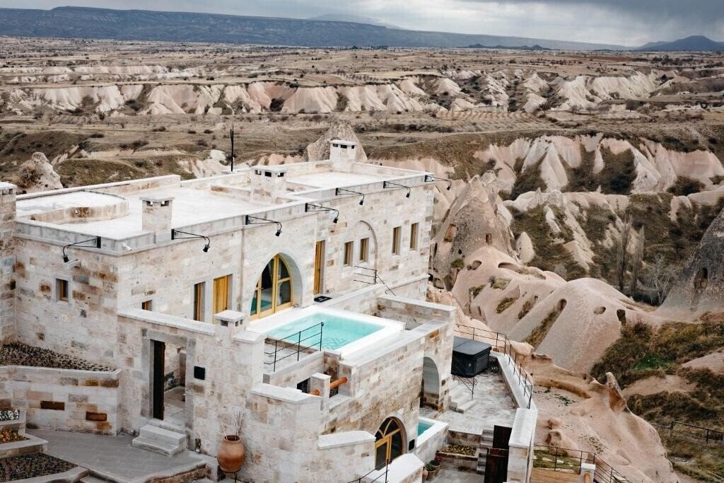 Отель Millstone Cave Suites 5*