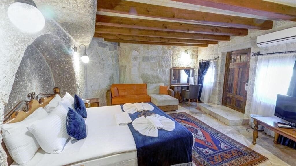 Elegance Cave Suites 4* фотосуреті