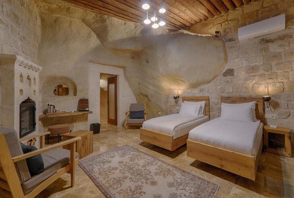 Фото Solem Cave Suites 4*