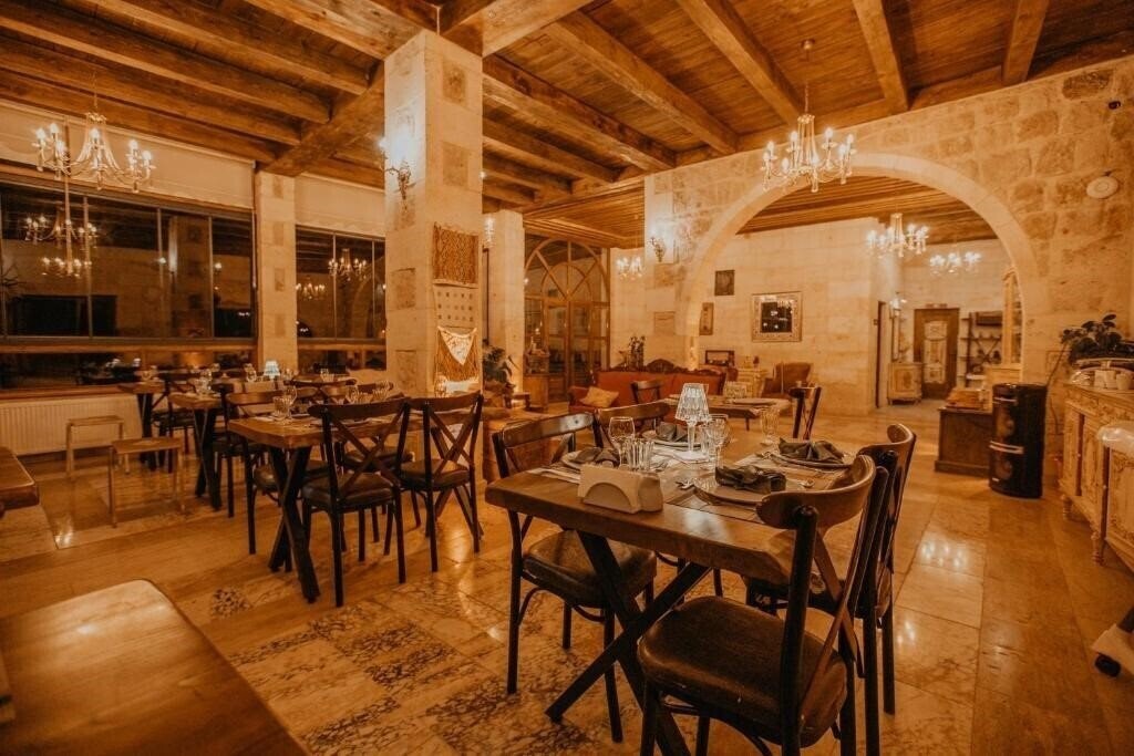 Serenus Cave Suites 4* суреті