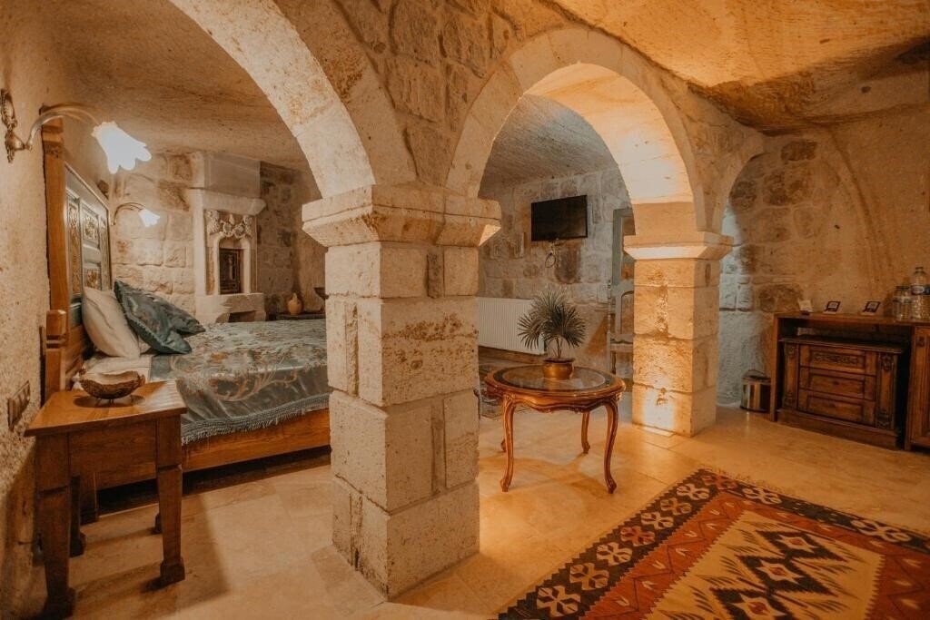 Serenus Cave Suites 4* суреті