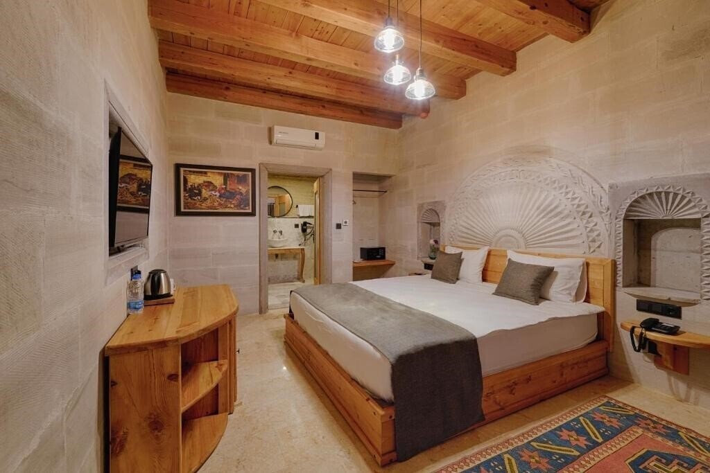 Отель Concept Cave Suites 5*