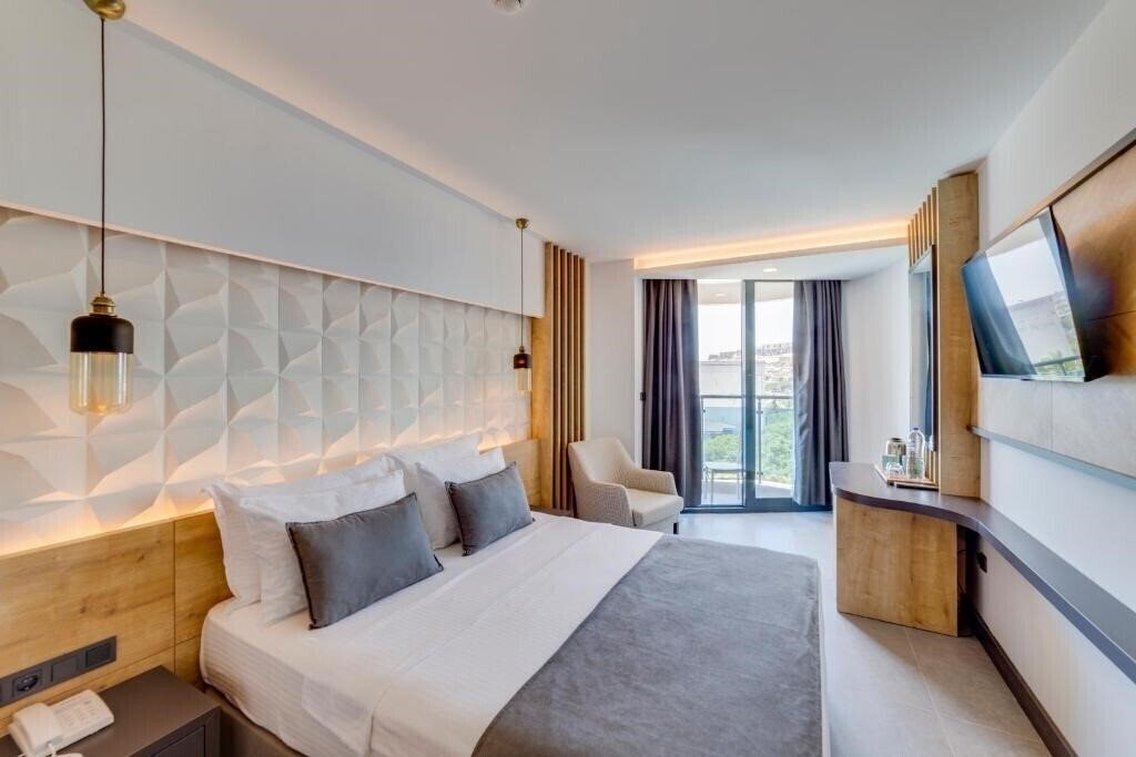 Фото Signature Blue Resort Kusadasi (ex. Grand Ozcelik) 5*