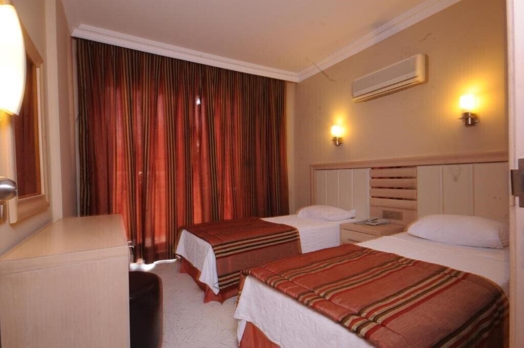 Фото Candan Apart 4*
