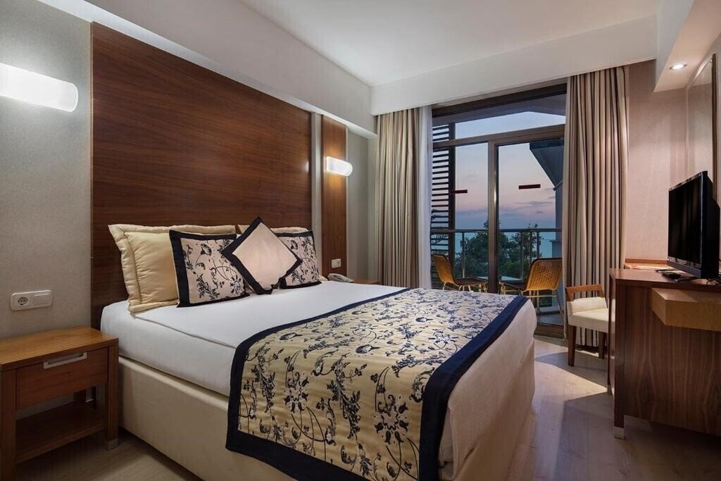 Фотография Trendy Side Beach 4*