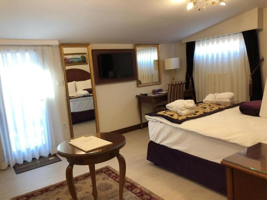 GLK Premier Regency Suites & SPA (ex. Best Western Premier Regency Suites & SPA) 4* суреті